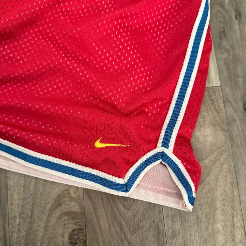 Vintage retro Nike red mesh shorts with blue piping